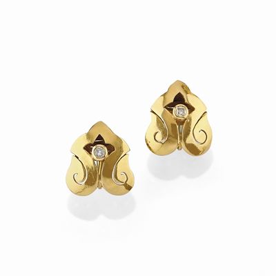 Orecchini in oro giallo 18K con diamanti taglio brillante