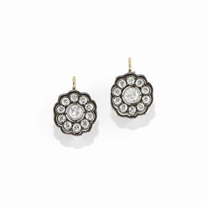 A silver, 18K yellow gold and diamond earrings, early 20th Century, defects