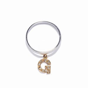 A 18K red and white gold with diamond ring