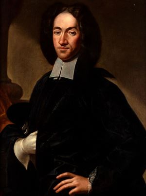 Portrait of a gentleman, half length, in a dark damask suit