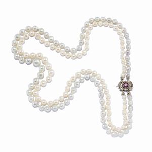 A 18K white gold, cultured pearl, ruby and diamond necklace