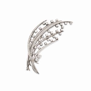A 18K white gold and diamond brooch