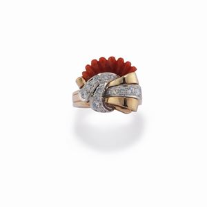 A 14K two-color gold, coral and diamond ring
