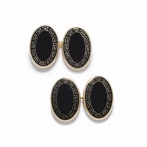 A 18K yellow gold and enamel cufflinks