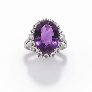 A 18K white gold, amethyst and diamond ring