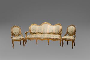 Eight armchairs and a three-seater sofa in carved and gilded wood, with plant motifs and scrolls, 19th century