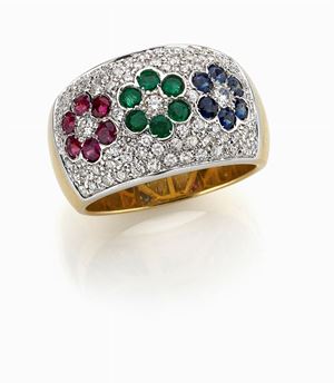 <p class="Corpo">WHITE AND YELLOW GOLD 18K RING WITH PAVÉ DIAMONDS AND RUBIES, SAPPHIRES AND EMERALD