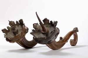 Two bronze torches, 17th century