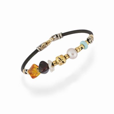 Bracciale in oro giallo 18K con perla e pietre