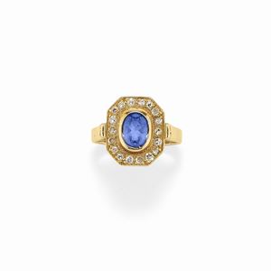 A 18K yellow gold, sapphire and diamond ring