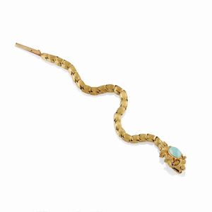 A 18K yellow gold, turquoise and ruby bracelet, circa 1950