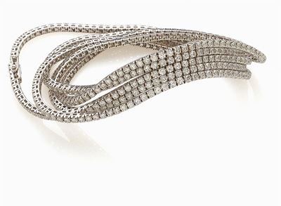 Bracciale tennis in oro bianco 18K e diamanti a taglio brillante