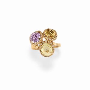 A 18K red gold, quartz, amethyst, olivine and diamond ring