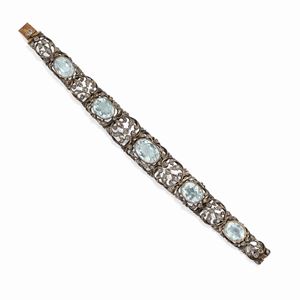 A yellow gold, silver, aquamarine and diamond bracelet, early 20th Century