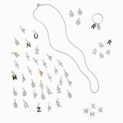 Collezione di quaranta nove oggetti in oro 18K con diamanti incolori e neri