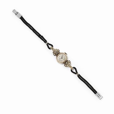Orologio da donna in oro bianco 18K con diamanti, inizio XX secolo