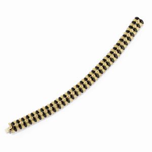A 18K yellow gold and black enamel bracelet, circa 1960