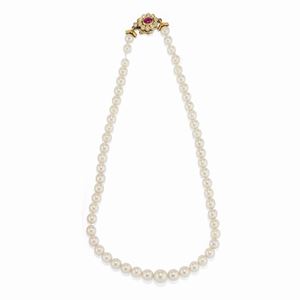 A 18K yellow gold, ruby, pearl, diamond earrings and necklace
