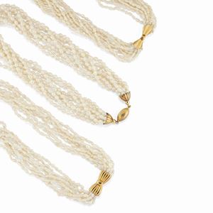 Two 18K yellow gold and one gilded metal and pearl necklaces