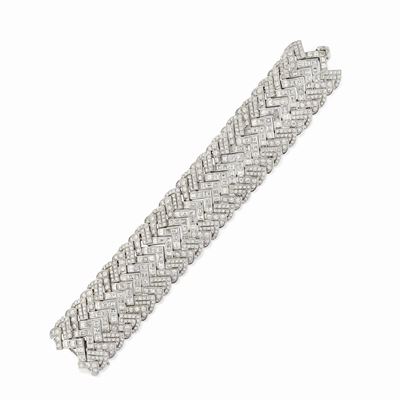 Bracciale in platino con diamanti taglio carré e brillante