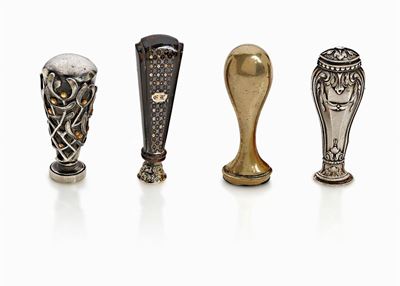 Quattro sigilli d'epoca in argento, ebano e pietra dura