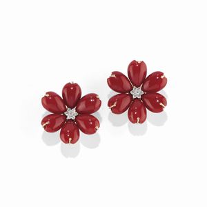 A 18K two-color gold, coral and diamond earclips
