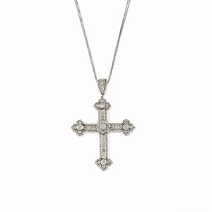 A platinum and diamond pendant, early 20th Century with a modern silver chain