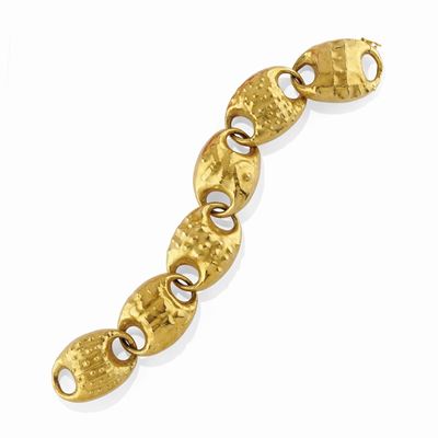 Bracciale in oro giallo 18K con decorazioni ovali stilizzate