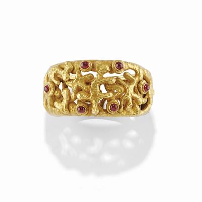 Bracciale rigido in oro giallo 18K con rubini cabochon