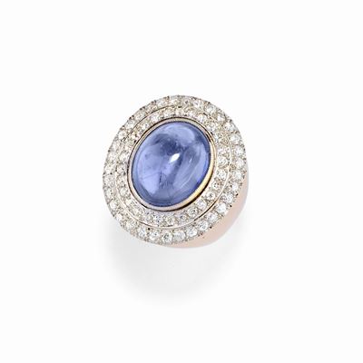 Anello in oro rosso 18K e platino con zaffiro cabochon e diamanti