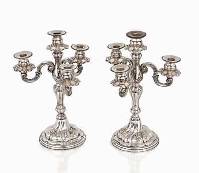 Coppia di candelabri in argento, fine XIX secolo