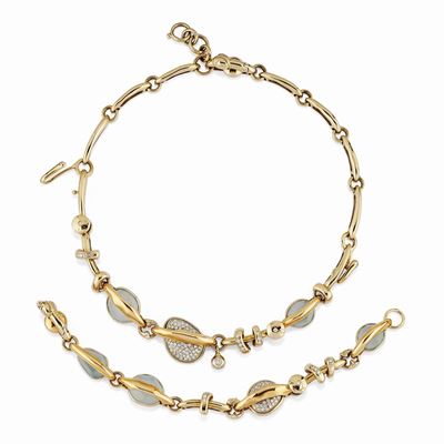Demi-parure in oro bicolore 18K con diamanti e acquamarina