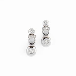 A 18K white gold and diamond earrings