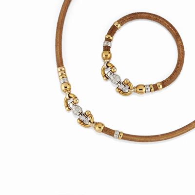 Demi-parure in oro bicolore 18K con diamanti e cuoio