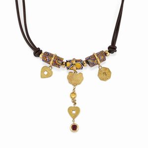  - A 18K yellow gold, diamond, murrine and leather string necklace