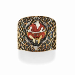 An important silver, 18K yellow gold, onyx, coral, diamond and gemstone bangle