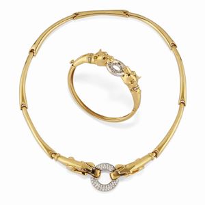 A 18K yellow gold and diamond demi parure, necklace and bracelet