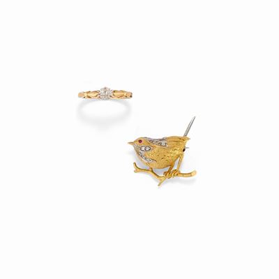 Anello e spilla in oro bicolore 18K con diamanti