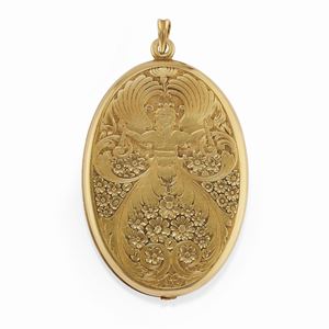 A 18K yellow gold and silver pendant with photoframe