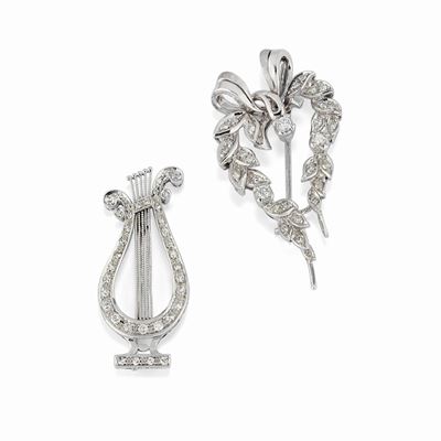 Due spille in oro bianco 18K con diamanti taglio brillante e huit-huit