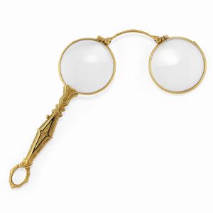 A gold plated lorgnette, with case
