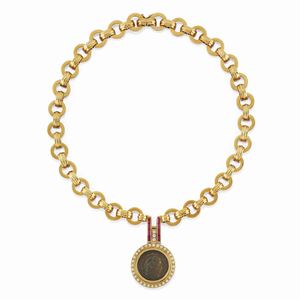 A 18K yellow gold, diamond and ruby necklace