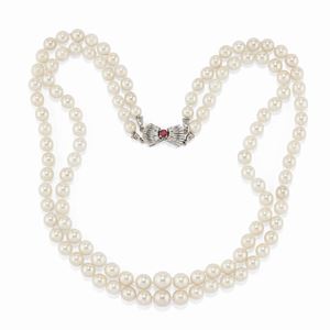 A 18K white gold, diamond, ruby and cultured pearl necklace