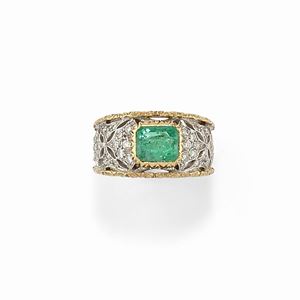 A 18K two color gold, emerald and diamond ring, signed M. Buccellati