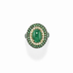 A 18K yellow gold, emerald and diamond ring