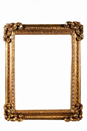 Frame in carved and gilded wood, 16th century