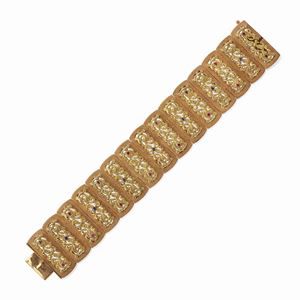 A 18K yellow gold, ruby and sapphire bracelet, circa 1950