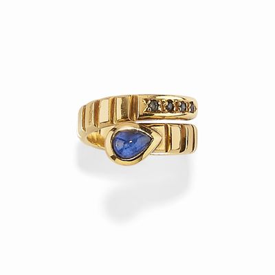 Anello a serpente in oro giallo 18K con pietre blu