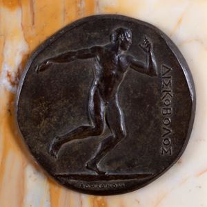 Bronze plaque with bas-relief depicting discus thrower