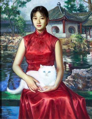 Portrait of young woman in red dress with cat